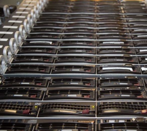 Close-up of rack-mounted servers, front panels stacked in a rack